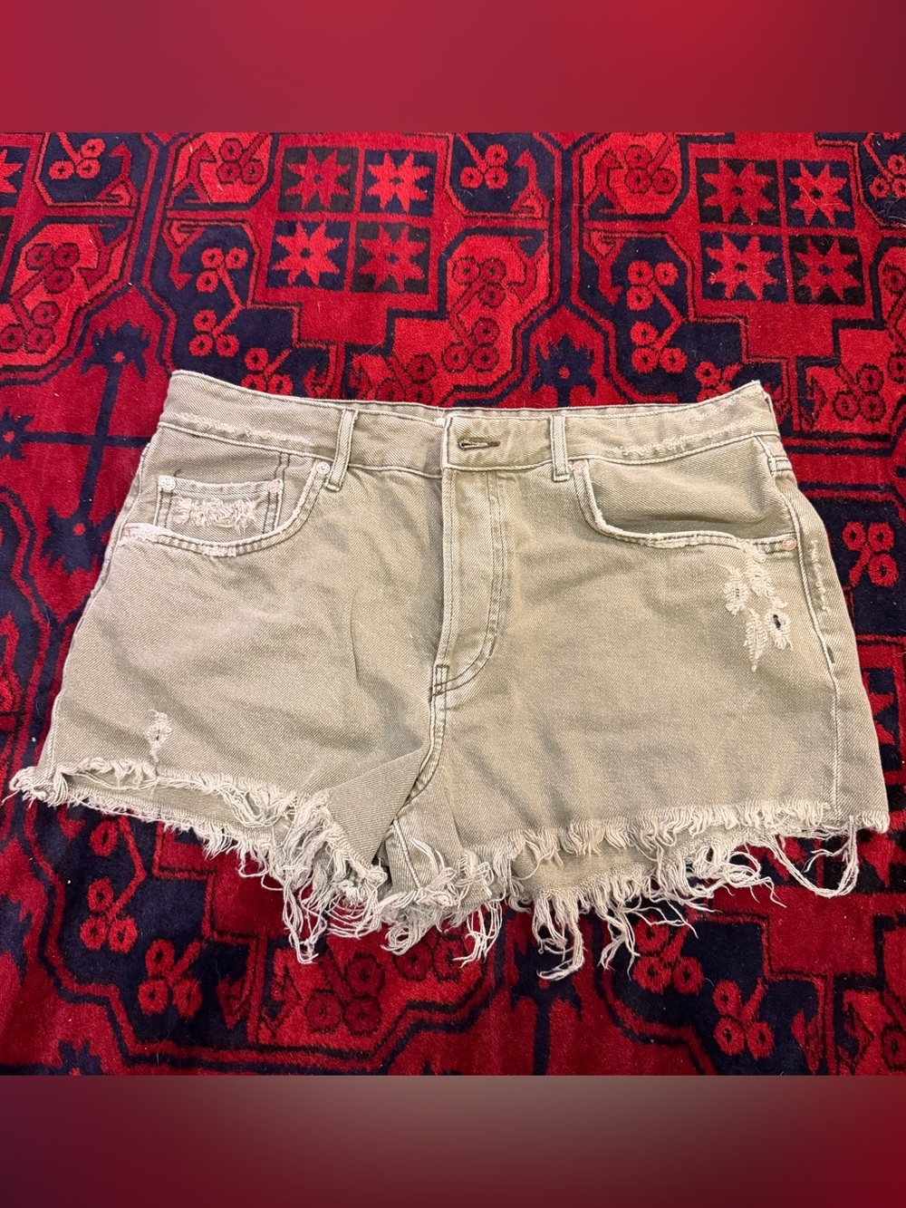 Free people green distressed shorts
